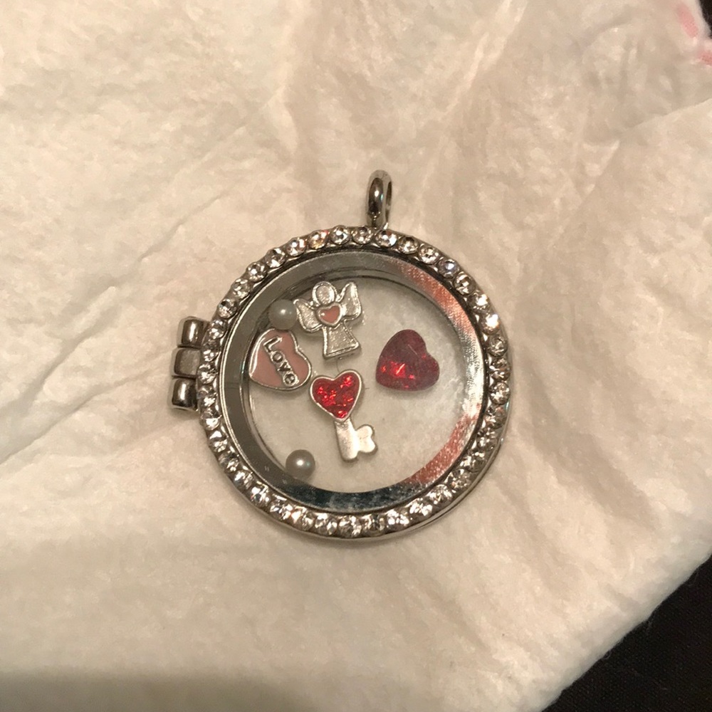 Locket with charms